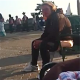 A seemingly normal-looking older woman brazenly takes a piss in public while sitting on a park bench in Santa Monica, California. She later discreetly pulls up her pants thinking that nobody can see her. Some shocked tourists secretly record the event.